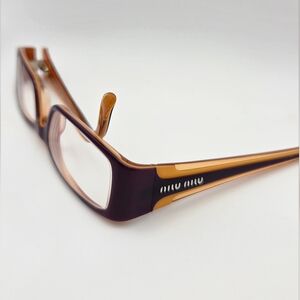 Miu Miu Purple and Orange Eye Glasses Ready For You To Put Your Lenses In.